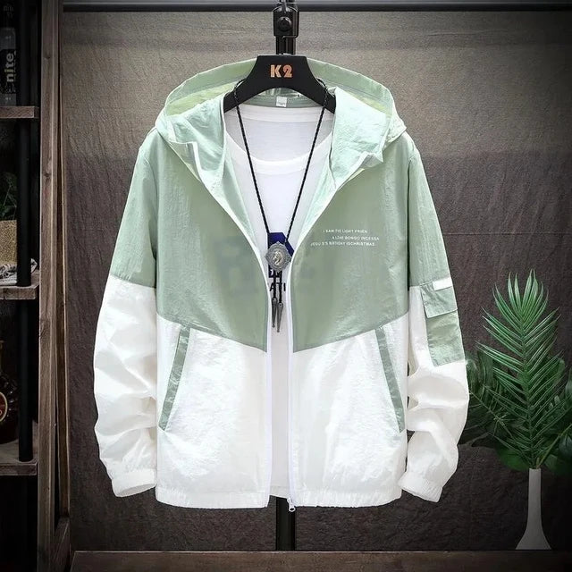 panel varsity outerwear, 2025 trend, for men, fall streetwear outfit, oversized style, layered fashion, modern aesthetic, graphic detail