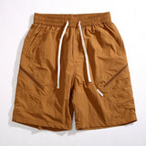 summer quick drying shorts mens loose straight casual sports pants thin breathable solid color zipper pocket cargo pants unique cargo style 953