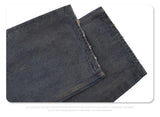 Cut Jeans with a mud-dye knife