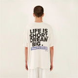 Flame-core tee with graffiti bubble letters and retro edge
