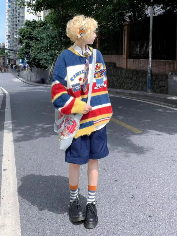 varsity flame pullover for men with bold graphic knit design, perfect for 2025 fashion, street fashion menswear trend for sea