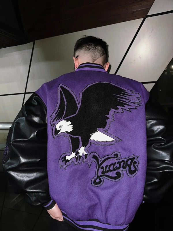 panel varsity outerwear, 2025 trend, for men, fall streetwear outfit, oversized style, layered fashion, modern aesthetic, graphic detail