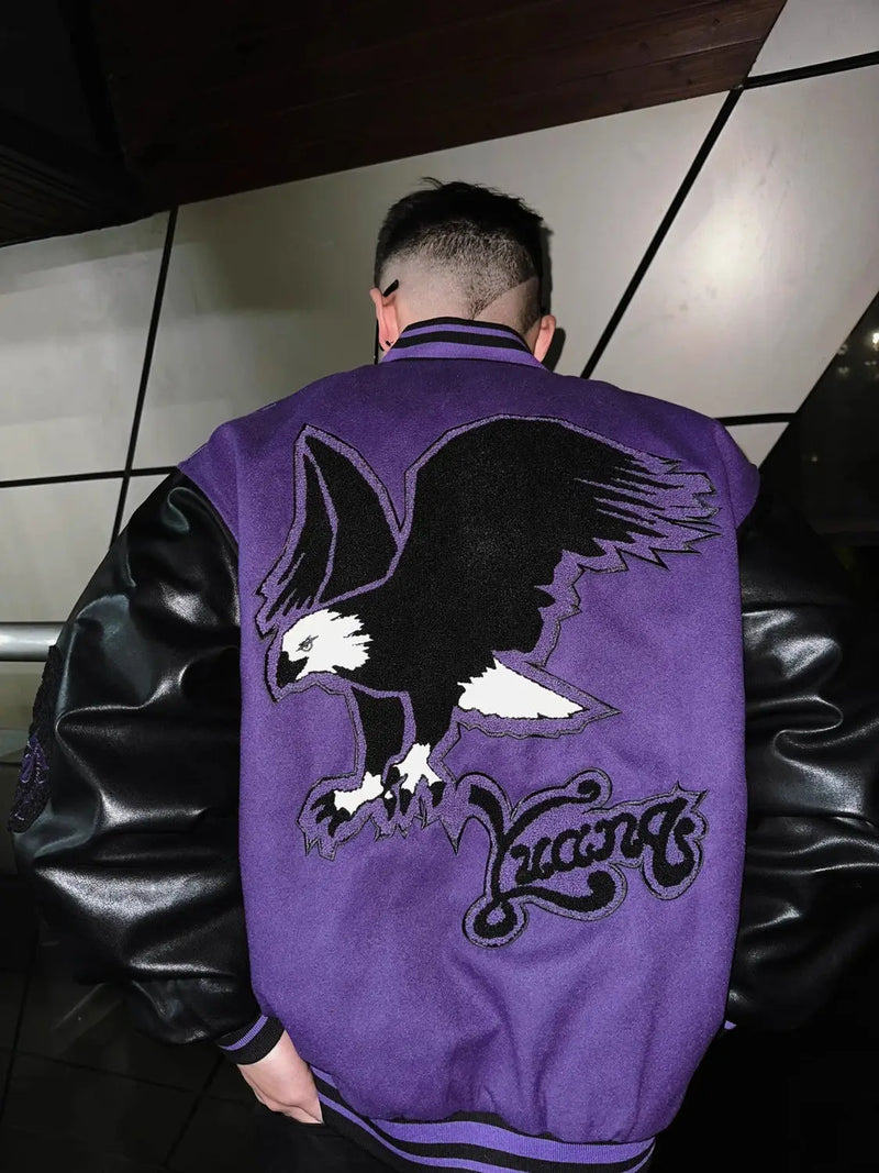 panel varsity outerwear, 2025 trend, for men, fall streetwear outfit, oversized style, layered fashion, modern aesthetic, graphic detail
