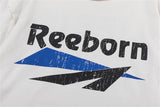 Grunge-style t-shirt with faded texture and ripped font