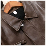 Retro hot girl camisole irregular big swing skirt short leather jacket coffee color set two piece sets womens outifits dress