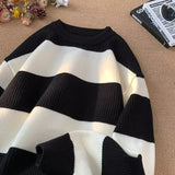 oversized flame jumper, 2025 fashion trend, fire knit jumper in oversized streetwear fashion