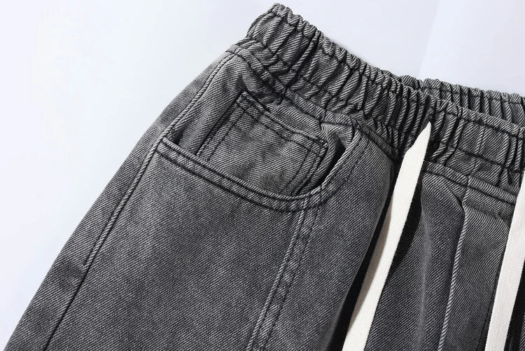fashion loose streetwear denim pants unisex casual drewstring elastic waist jean pants hip hop trousers joggers mens baggy jeans unique joggers style 3266