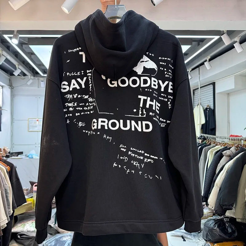 Retro 90s skater hoodie with washed-out punk rock vibe