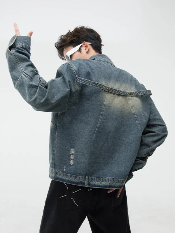 bold graphic coat, high-street look, for men, fall streetwear outfit, oversized style, layered fashion, modern aesthetic, graphic detail