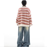 oversized knit pullover, fall/winter fashion, soft knit pullover with flame design, y2k fashion statement