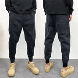 solid color black casual jeans slimming ankle length harem trousers trendy mens slim fit loose fit 2024 korean winter style pan denim street jeans
