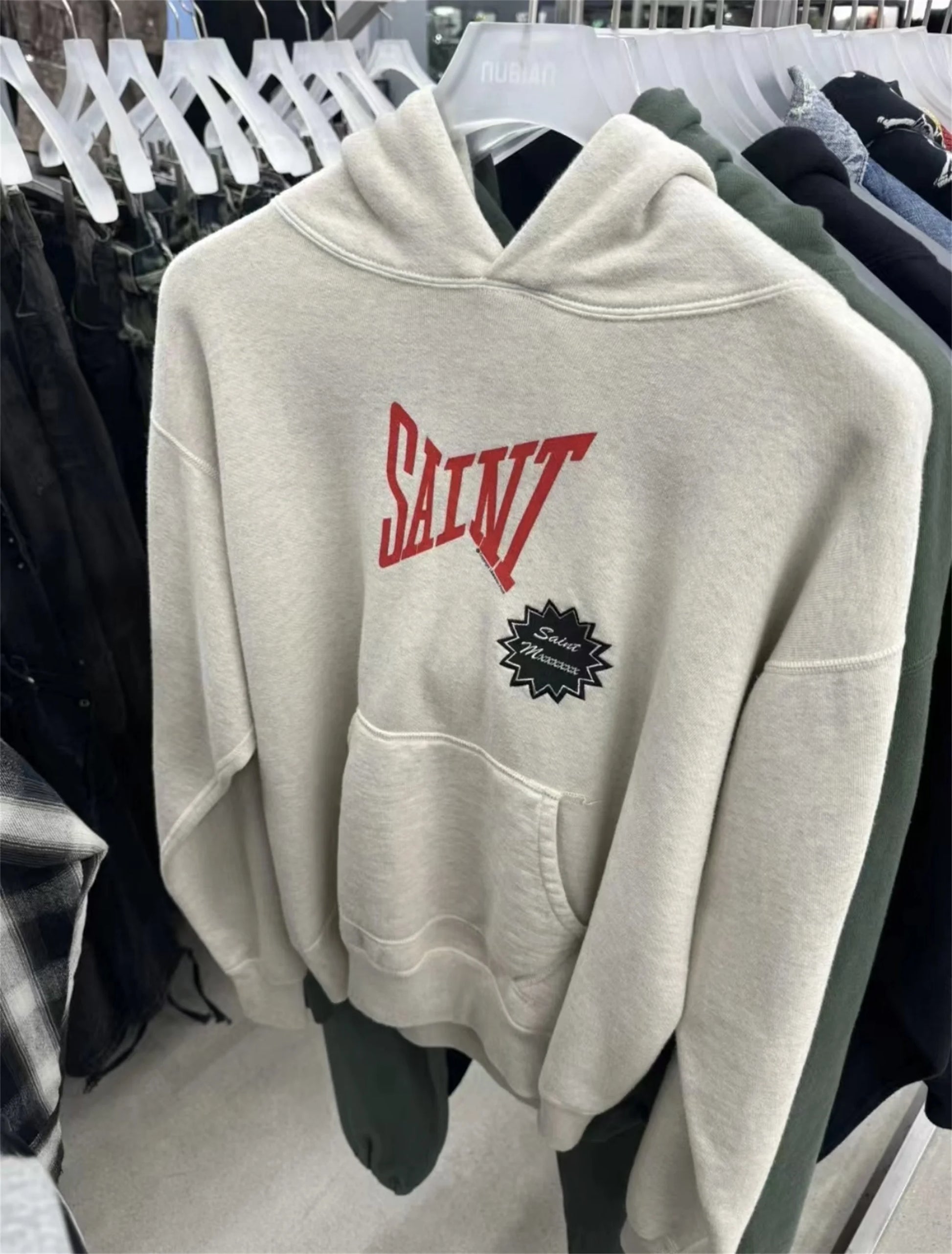 Grunge streetwear hoodie with washed-out and distressed design