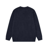 grunge knit sweater with heavyweight fabric, layered urban look for cold weather, street fashion menswear trend for seasonal 
