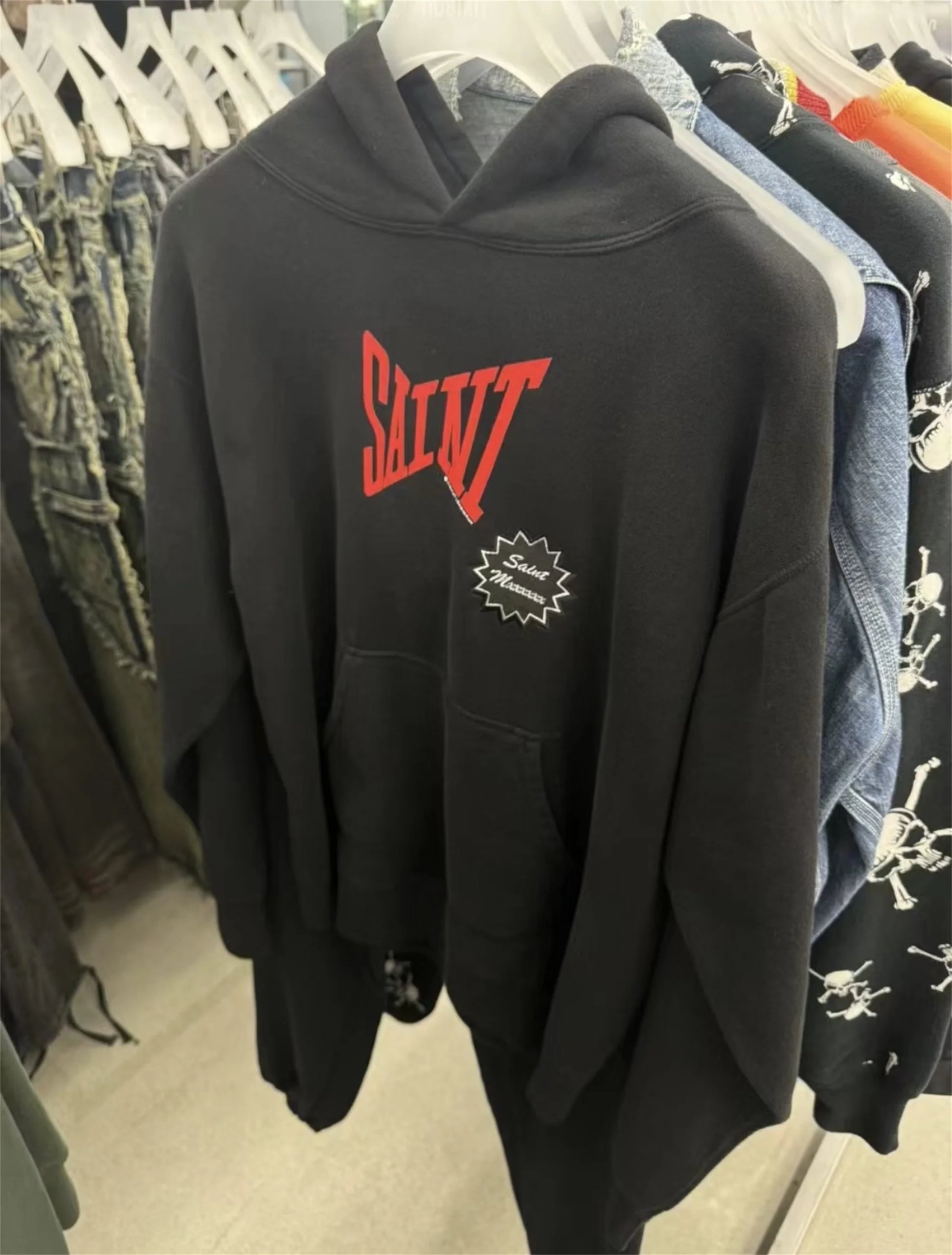 Urban goth hoodie with barbed wire and gothic text artwork