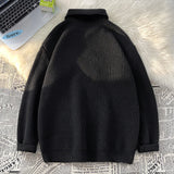 oversized flame jumper, 2025 fashion trend, fire knit jumper in oversized streetwear fashion