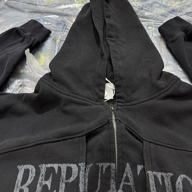 Urban streetwear hoodie with "Hustle Hard" slogan