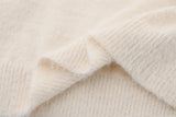 grunge knit sweater with heavyweight fabric, layered urban look for cold weather, street fashion menswear trend for seasonal 