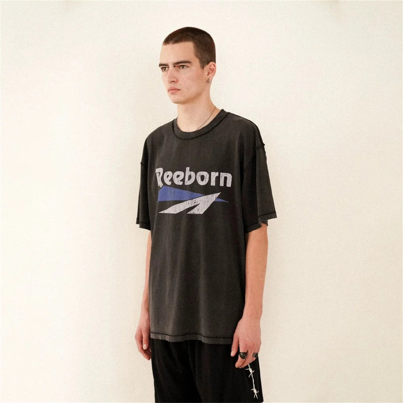 Y2K graphic t-shirt with flame text and pastel glitch overlay