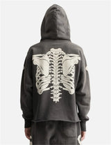 Y2K-inspired hoodie with chrome techwear effects
