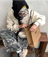 oversized grunge coat, photo-ready drip, for men, fall streetwear outfit, oversized style, layered fashion, modern aesthetic, graphic detail
