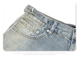 Straight Jeans with torn knees