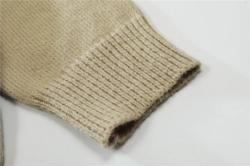 grunge knit sweater with heavyweight fabric, layered urban look for cold weather, street fashion menswear trend for seasonal 