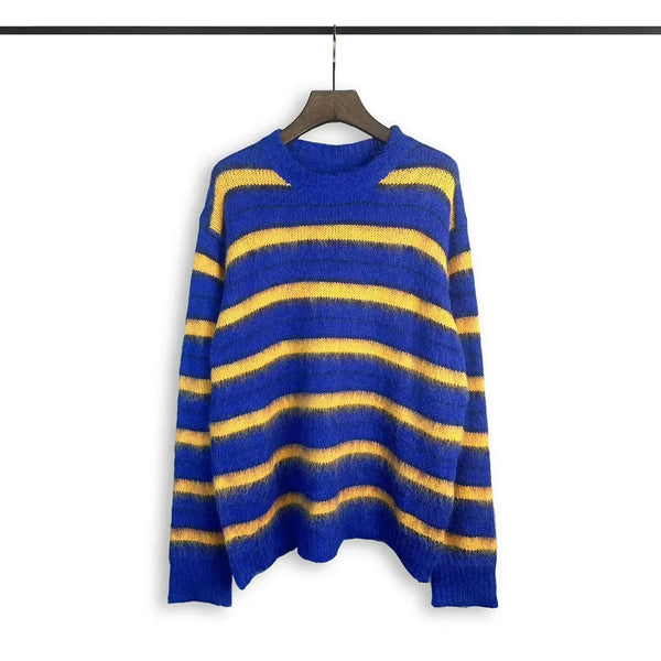 grunge knit sweater with heavyweight fabric, layered urban look for cold weather, street fashion menswear trend for seasonal 