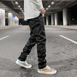 streetwear kanye slim fit feet coated black jeans pants for men pocket brushed wax tapered pants man casual cargo jeans y2k utility cargo pants