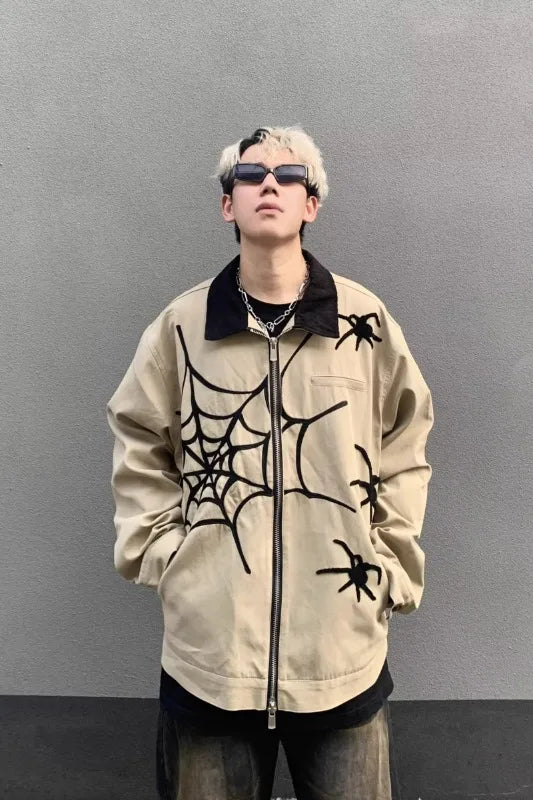 panel varsity outerwear, 2025 trend, for men, fall streetwear outfit, oversized style, layered fashion, modern aesthetic, graphic detail