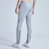rainbowtouches new thin casual pants men fashion slim fit solid color brand trousers sweatpants elastic men workout pant unique joggers style 1025