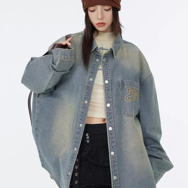 leather varsity jacket, fall winter fit, for men, fall streetwear outfit, oversized style, layered fashion, modern aesthetic, graphic detail