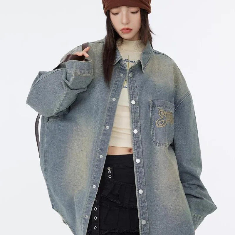 leather varsity jacket, fall winter fit, for men, fall streetwear outfit, oversized style, layered fashion, modern aesthetic, graphic detail