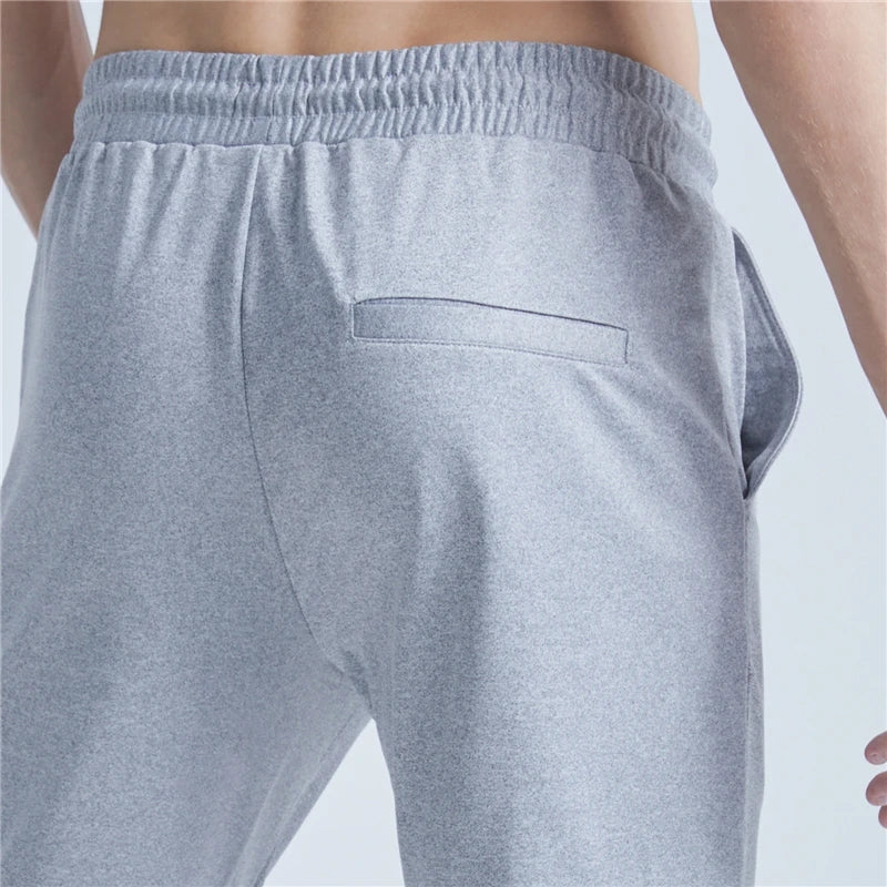 rainbowtouches new thin casual pants men fashion slim fit solid color brand trousers sweatpants elastic men workout pant unique joggers style 1028