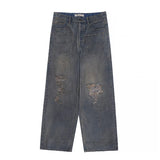 Cut Jeans with a mud-dye knife