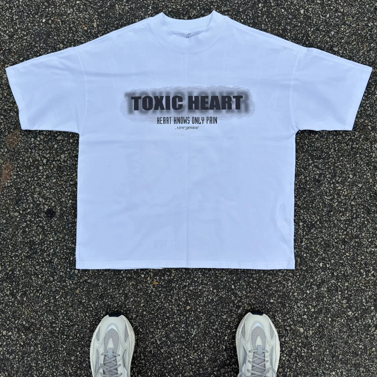Cartoon text t-shirt with pastel clouds and puffy icons