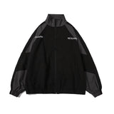 bold graphic coat, high-street look, for men, fall streetwear outfit, oversized style, layered fashion, modern aesthetic, graphic detail