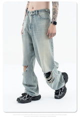 Straight Jeans with torn knees