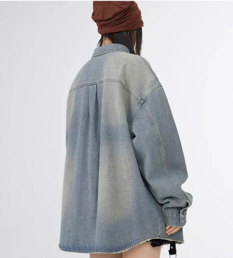 panel varsity outerwear, 2025 trend, for men, fall streetwear outfit, oversized style, layered fashion, modern aesthetic, graphic detail