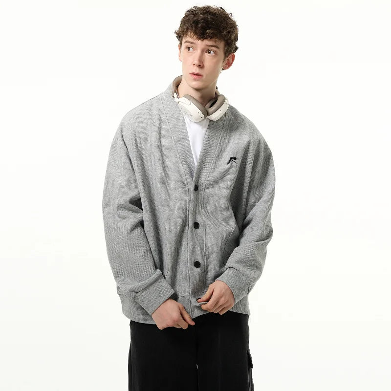 bold graphic pullover, layered streetwear look, soft knit pullover with flame design, y2k fashion statement