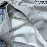 Baggy skateboarding hoodie with bold urban typography