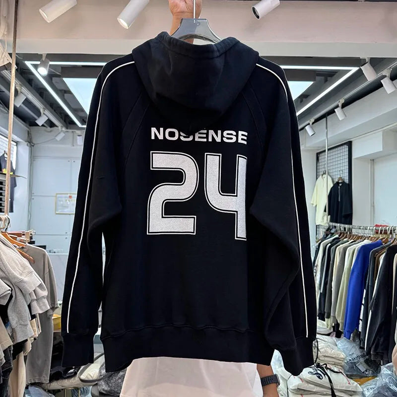 Y2K aesthetic hoodie with bold cybercore graphics