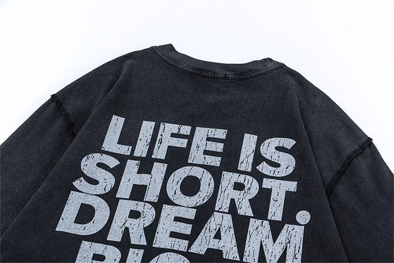 Hip-hop tee with gold font and luxury streetwear energy