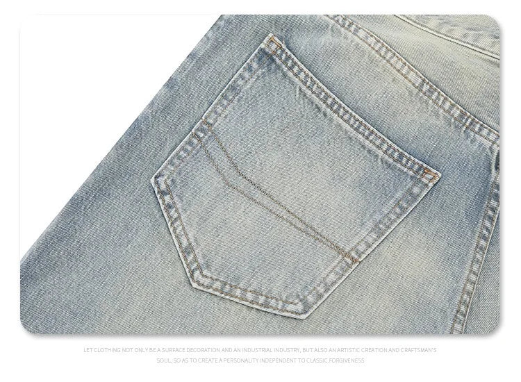 Straight Jeans with torn knees