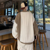 oversized flame jumper, 2025 fashion trend, fire knit jumper in oversized streetwear fashion