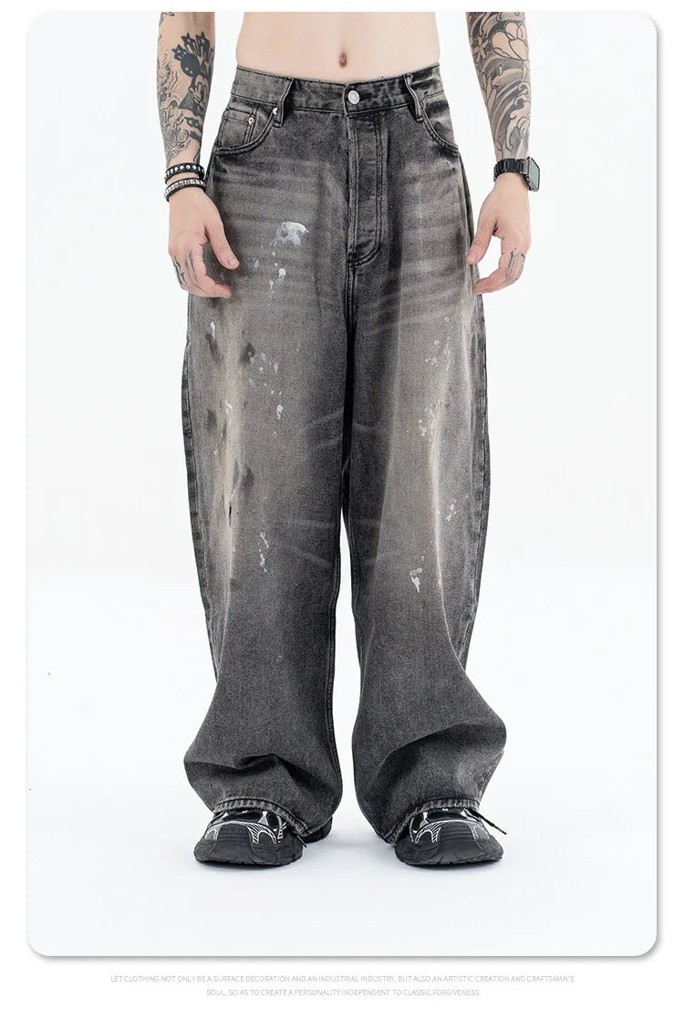 Splashing ink to wash old baggy retro jeans