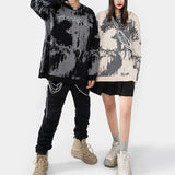 techwear street knit hoodie with oversized flame detail for urban fall winter outfits, street fashion menswear trend for seas