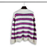 grunge knit sweater with heavyweight fabric, layered urban look for cold weather, street fashion menswear trend for seasonal 