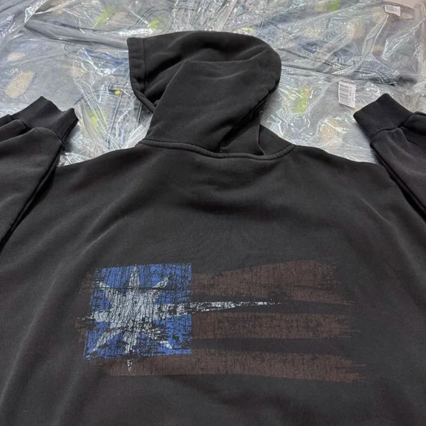 Retro alternative skate hoodie with rough-washed look
