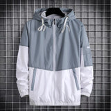 panel varsity outerwear, 2025 trend, for men, fall streetwear outfit, oversized style, layered fashion, modern aesthetic, graphic detail