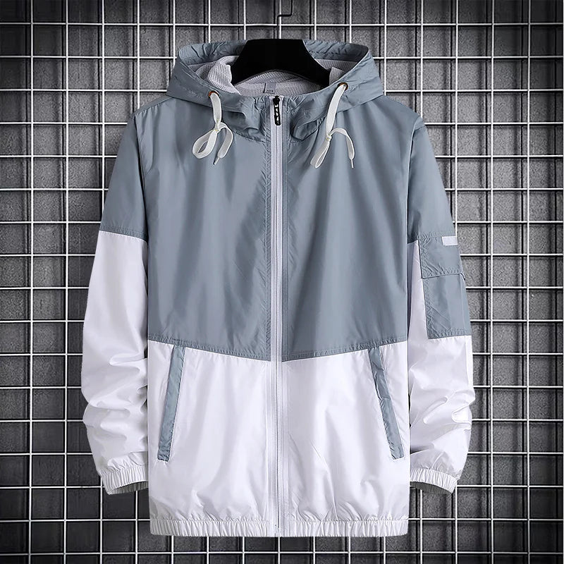 panel varsity outerwear, 2025 trend, for men, fall streetwear outfit, oversized style, layered fashion, modern aesthetic, graphic detail
